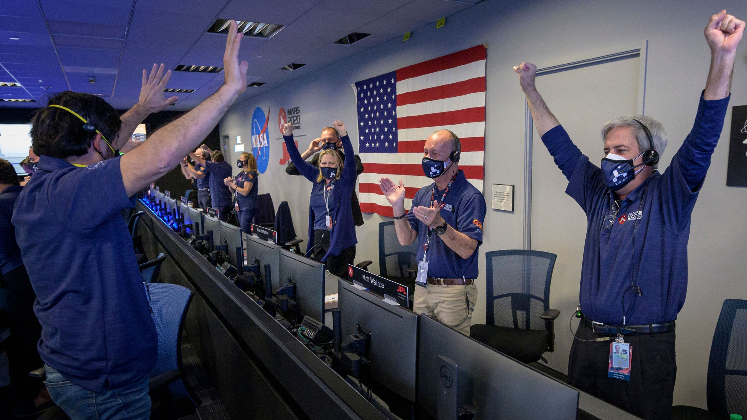 JPL Mission Control cheering with success at Perseverance's landing