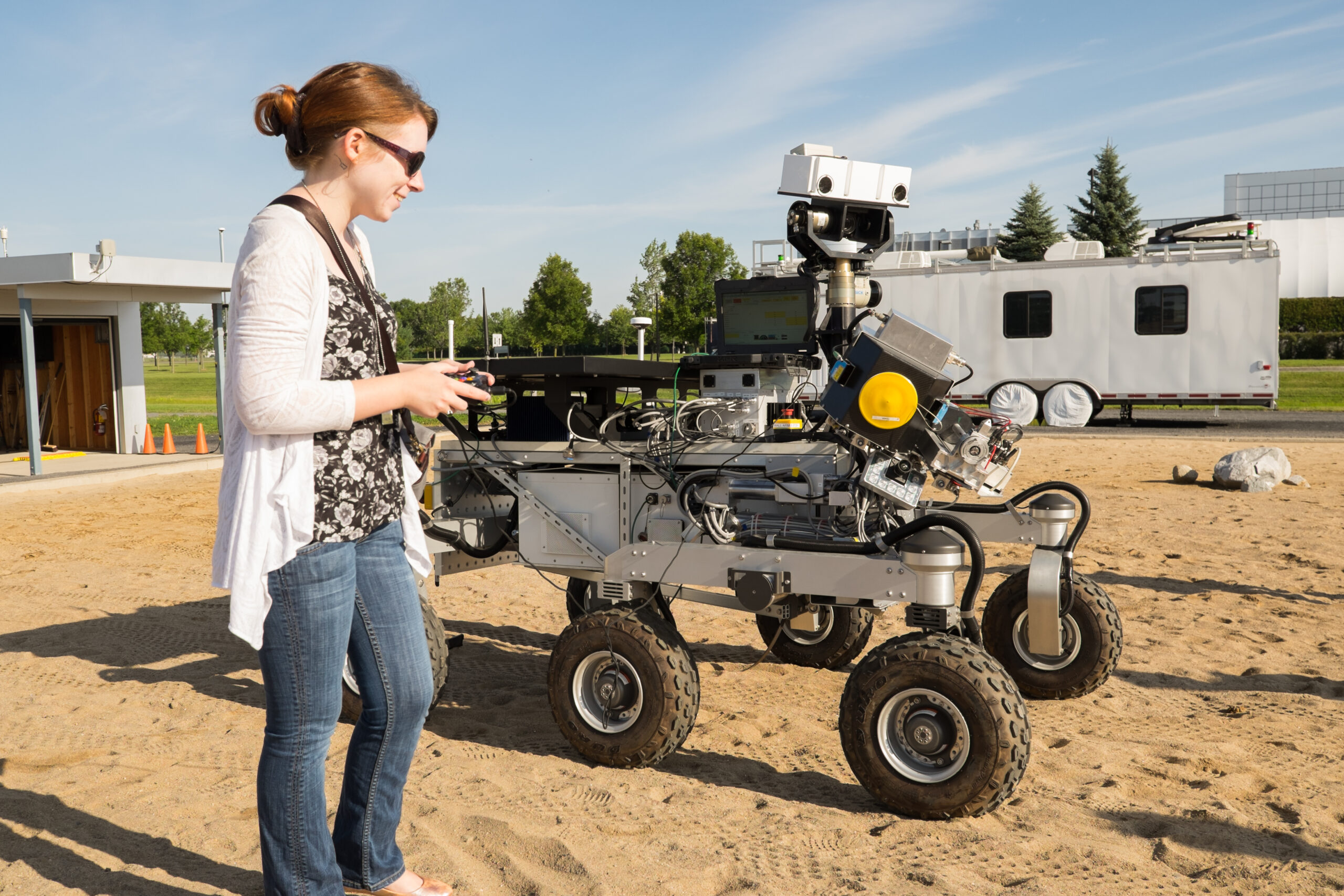 Tanya Harrison driving the Mars Exploration Science Rover (MESR) at the Canadian Space Agency headquarters.